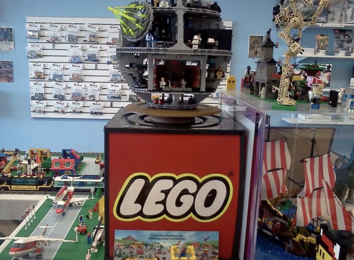 Large LEGO display with a rotating model at Oasis Trading Post